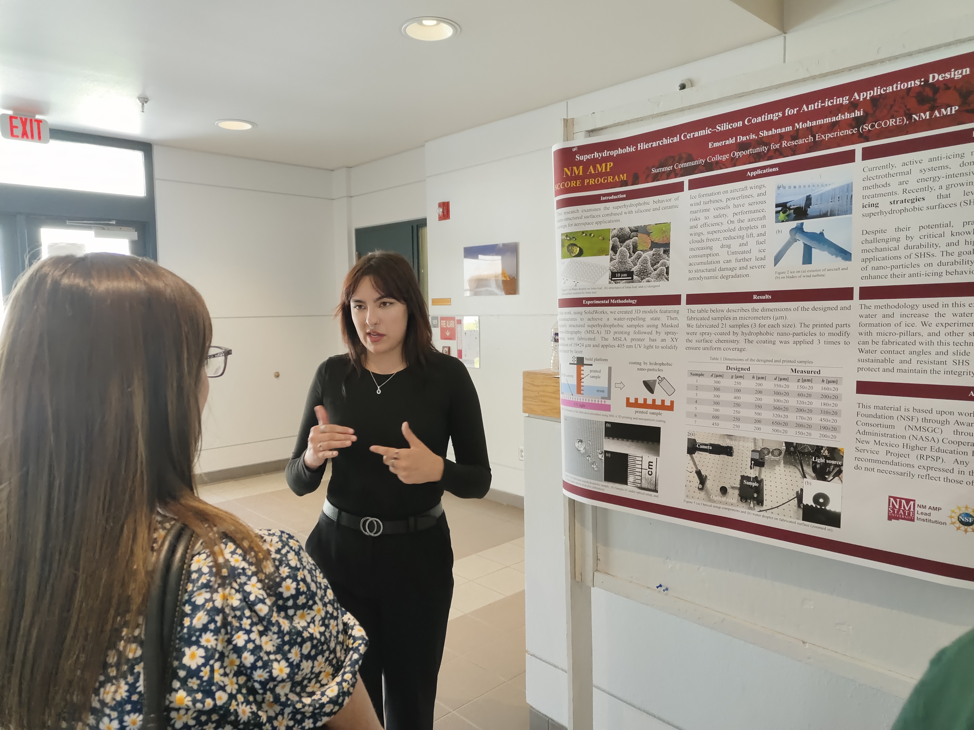 photo of Emerald presenting her poster